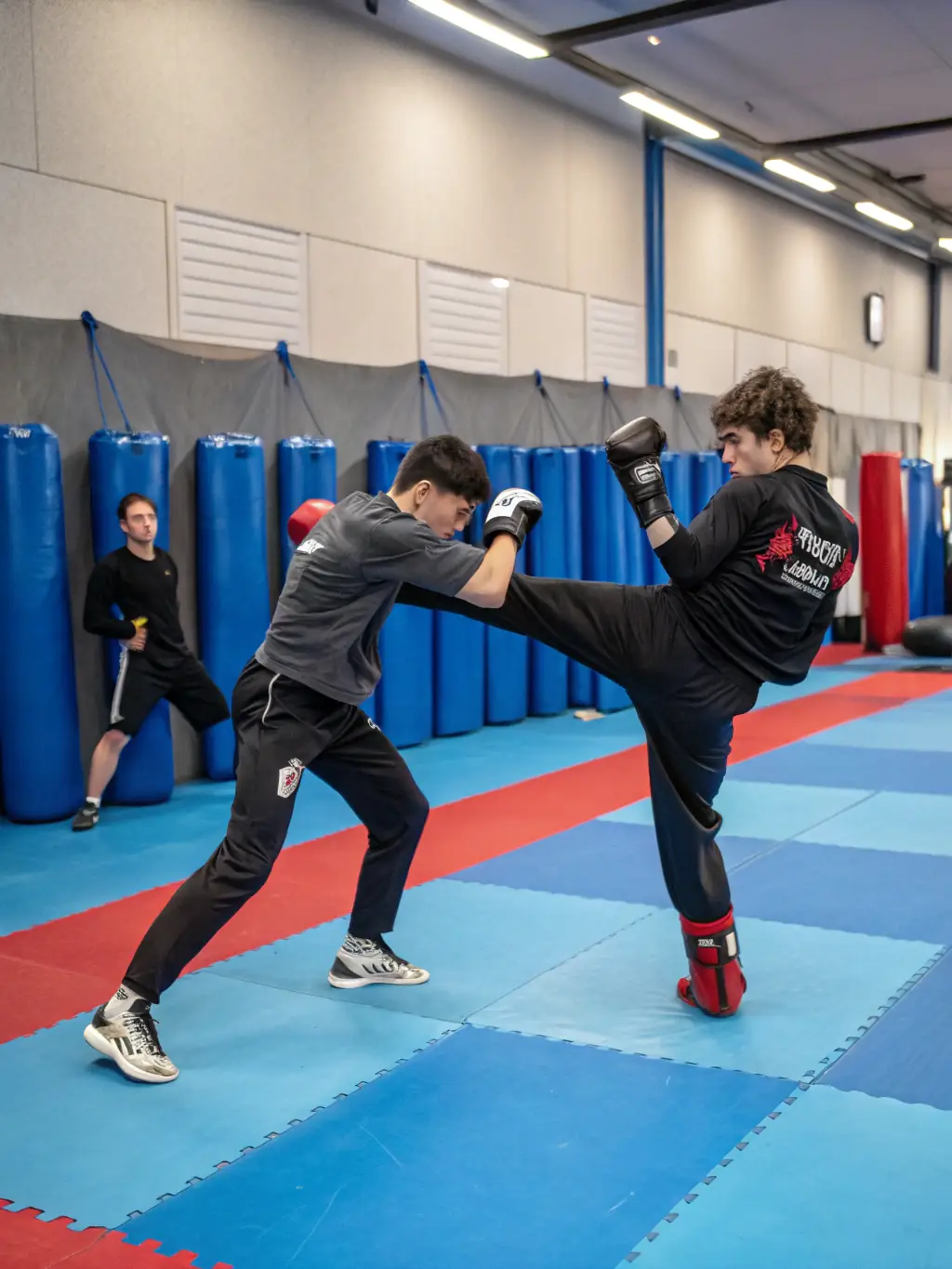 A striking photograph of kendo practitioners in full gear engaged in a spirited sparring match at YOKAI JUDO NEUVIC, capturing the tradition and precision of kendo.